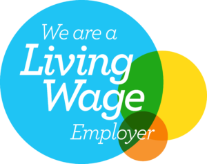 We are a Living Wage Employer - white text on a background of blue, yellow and orange overlapping circles